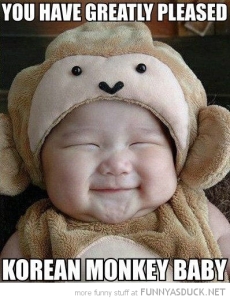 funny-happy-smiling-kid-baby-greatly-pleased-korean-monkey-baby-pics